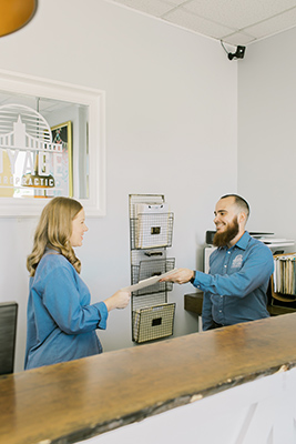 Chiropractic Jacksonville FL Assistants Behind Desk